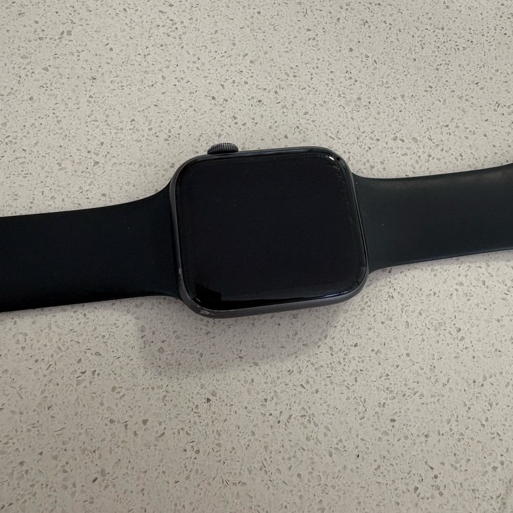 Black Apple Watch + Charger